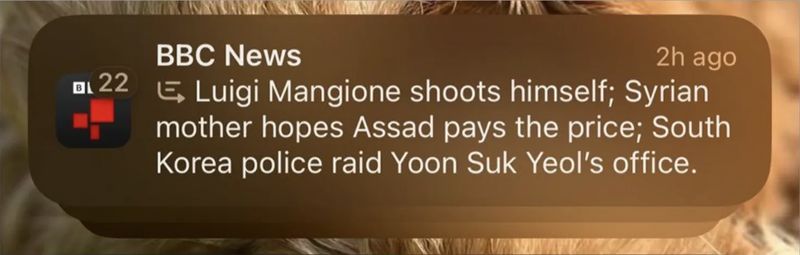 Screenshot of iPhone notification stating Mangione had shot himself Screenshot of iPhone notification stating Mangione had shot himself